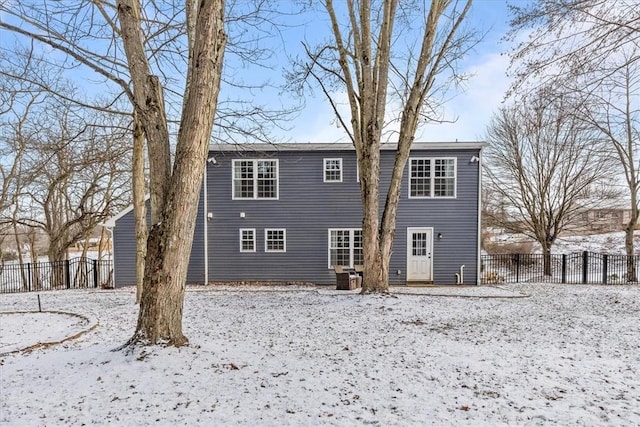 view of snow covered house