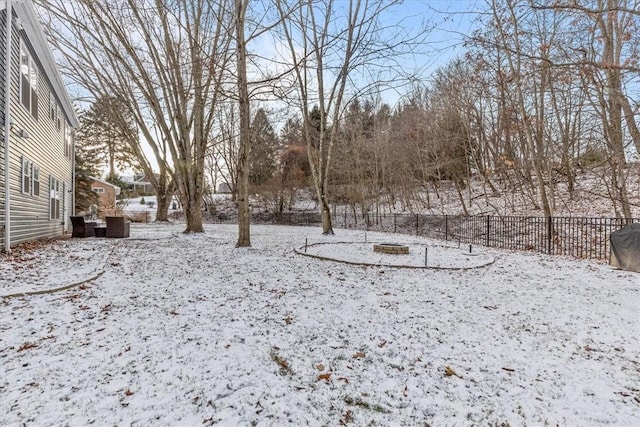 view of yard covered in snow