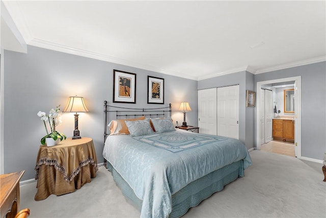 bedroom with ornamental molding, light colored carpet, connected bathroom, and a closet