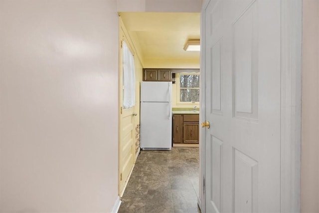 hall featuring sink