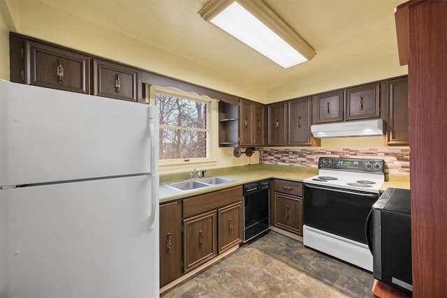 kitchen with white appliances, backsplash, dark brown cabinetry, and sink