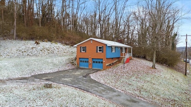 view of front of property with a garage