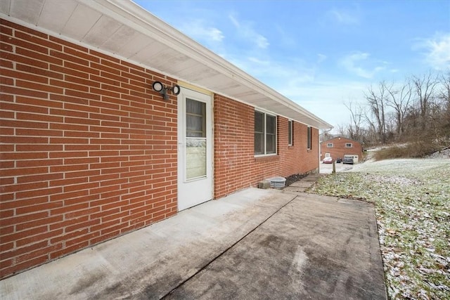 view of property exterior featuring a patio