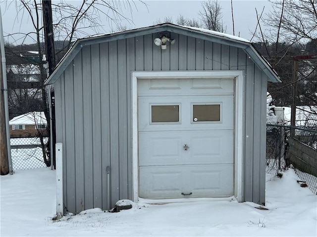 view of snow covered garage