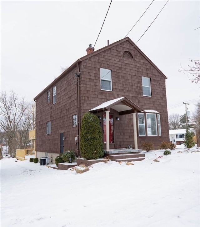 view of property with central AC unit