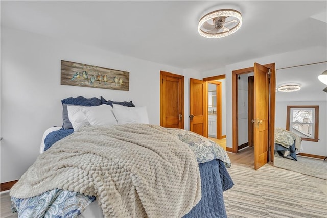 bedroom featuring light wood-type flooring