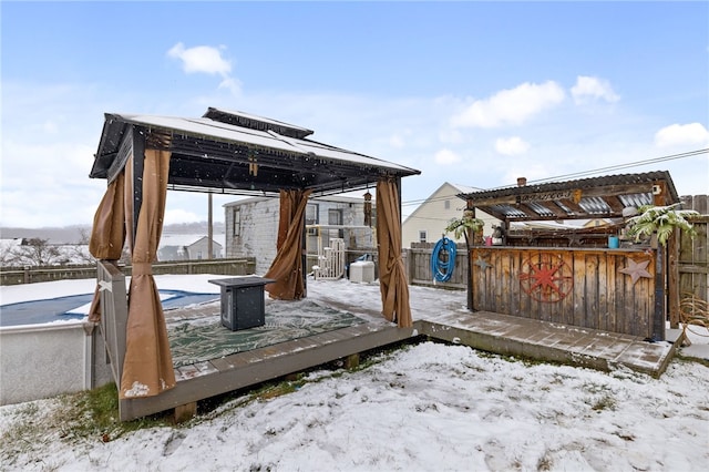 view of snow covered deck