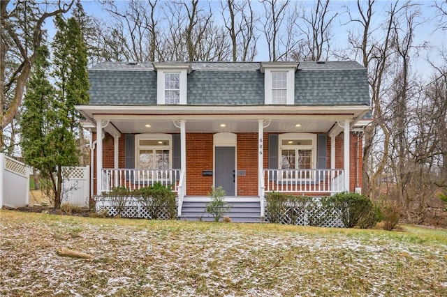 view of front facade featuring covered porch