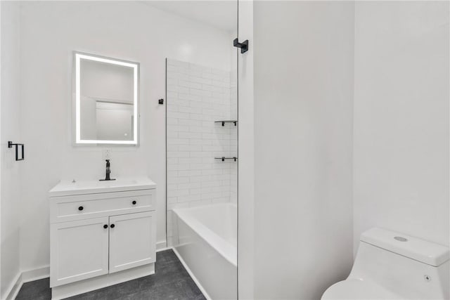 full bathroom featuring vanity, toilet, and tiled shower / bath combo