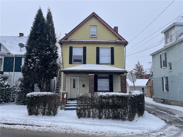 view of front property featuring a porch