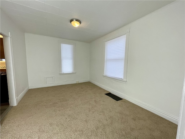 view of carpeted spare room