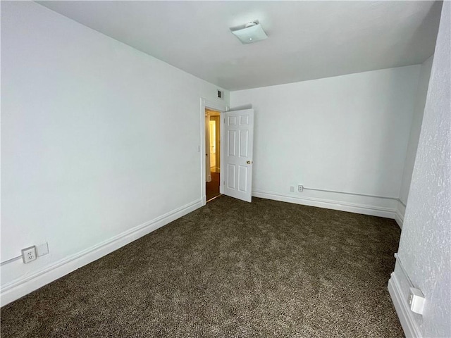 interior space featuring dark carpet