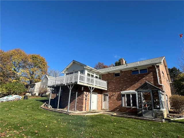 134 Shanor Hts, Center Twp But, PA 16001 - rear view of property with brick siding, a wooden deck, a yard, a chimney, and a sunroom