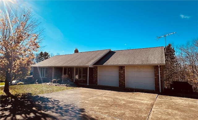 single story home with a garage