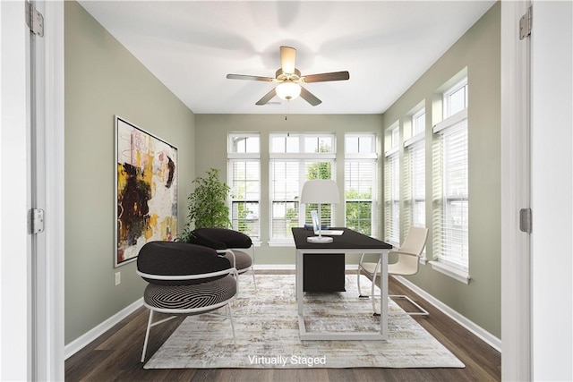 office space featuring ceiling fan and dark wood-type flooring