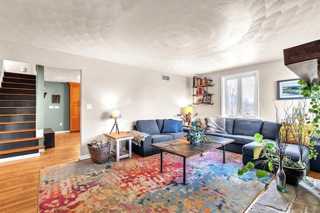 living room with hardwood / wood-style flooring