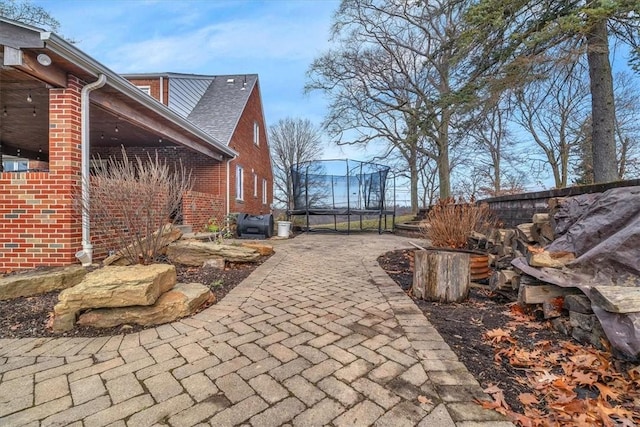 view of patio featuring a trampoline