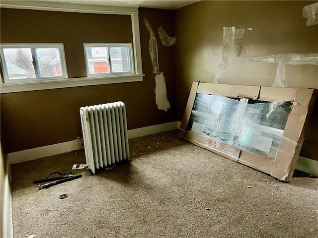 unfurnished room with radiator