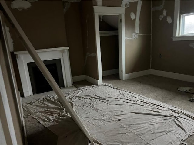 interior space featuring a fireplace and a closet