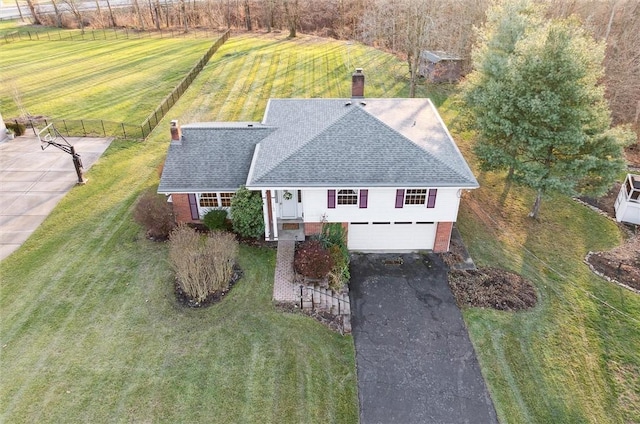 birds eye view of property featuring a rural view