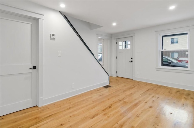 entrance foyer featuring light hardwood / wood-style flooring