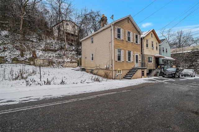 view of snow covered property