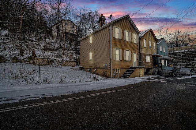 view of snow covered property