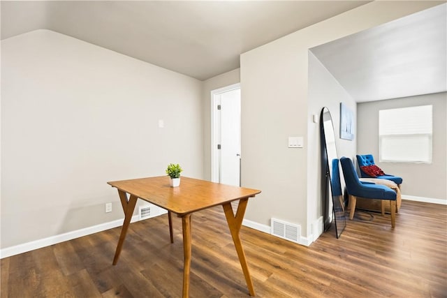 dining room with dark hardwood / wood-style floors