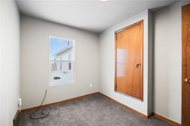 spare room featuring carpet flooring