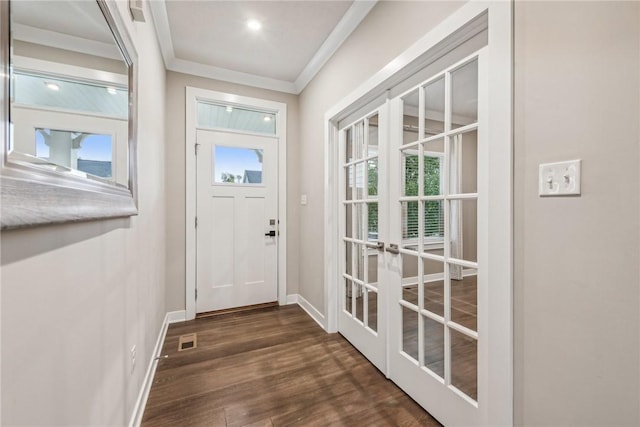 entryway featuring crown molding, french doors, and dark hardwood / wood-style floors