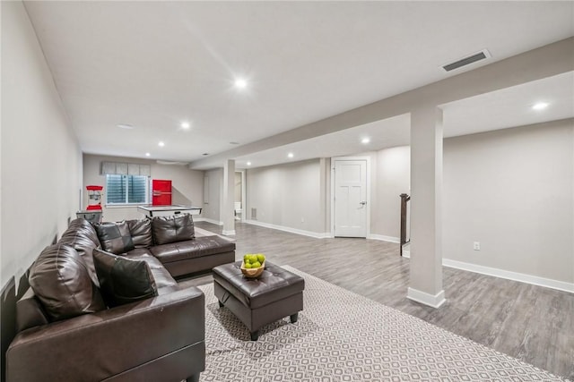 living room with hardwood / wood-style flooring