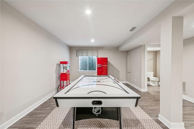 playroom featuring dark hardwood / wood-style floors