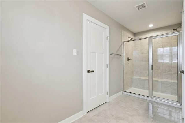 bathroom featuring walk in shower