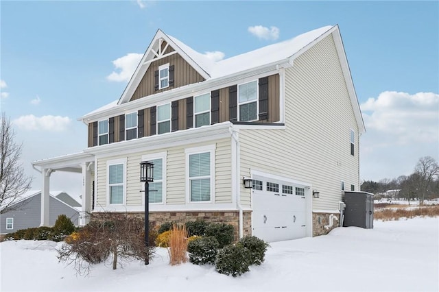 view of front of property with a garage