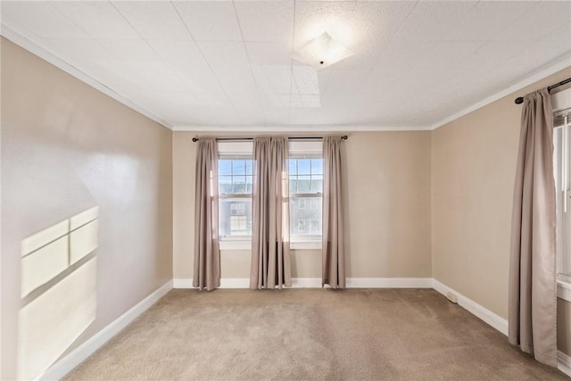 carpeted empty room with ornamental molding