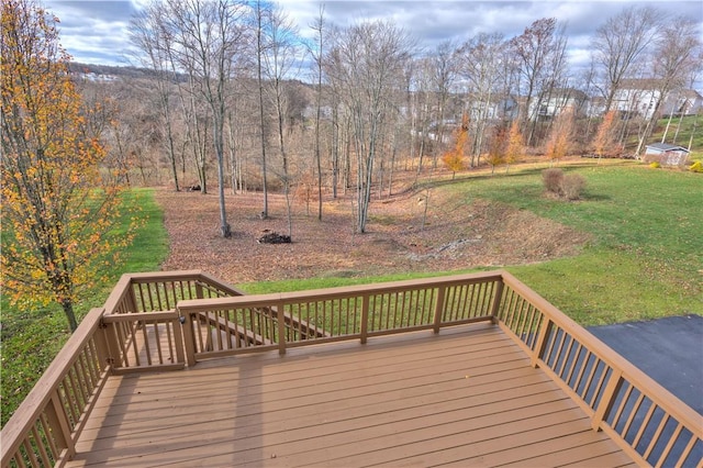 wooden deck with a yard