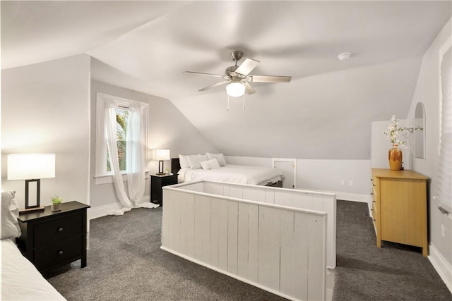 carpeted bedroom featuring ceiling fan and lofted ceiling