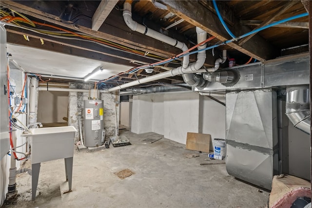 basement with sink and water heater