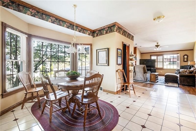 dining room featuring light tile patterned floors, a wealth of natural light, and ceiling fan