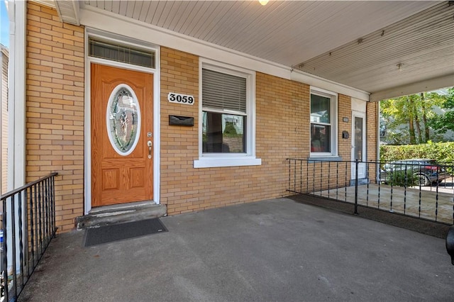 property entrance with a porch