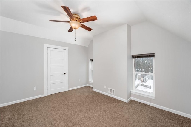 bonus room featuring carpet, vaulted ceiling, and ceiling fan