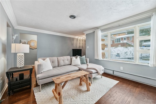 living room with a wealth of natural light, dark hardwood / wood-style flooring, a textured ceiling, and a baseboard heating unit