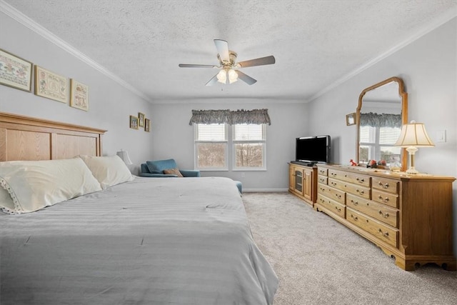 carpeted bedroom featuring a textured ceiling, ceiling fan, and ornamental molding