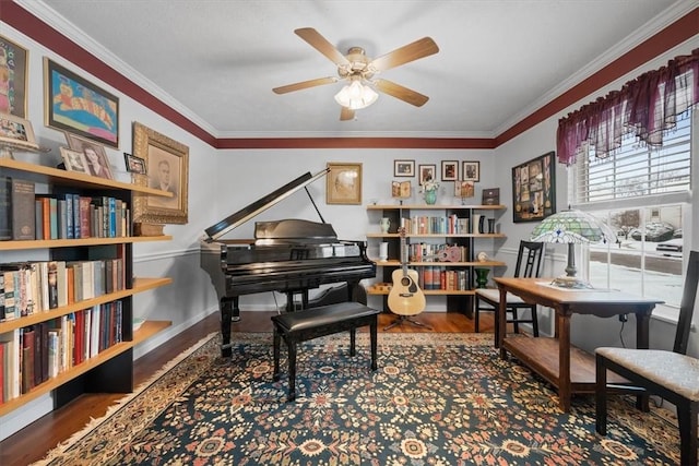 miscellaneous room with hardwood / wood-style flooring, ceiling fan, and ornamental molding