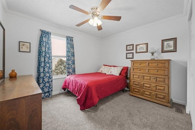 carpeted bedroom featuring ceiling fan and ornamental molding