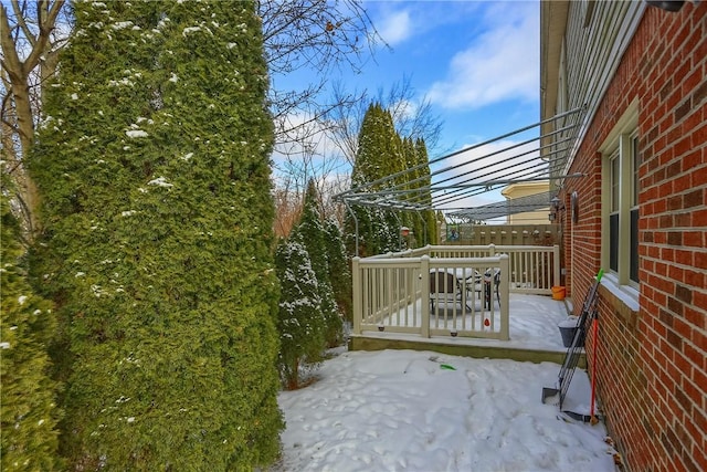 view of snow covered patio