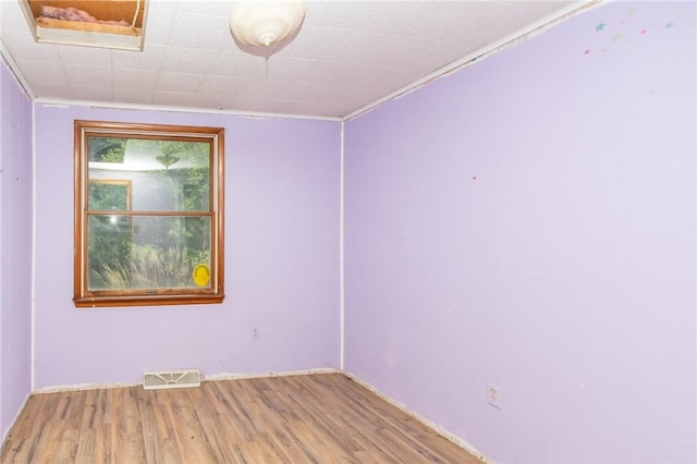 119 Deer Rd, Loyalhanna, PA 15681 - unfurnished room with wood finished floors and ornamental molding