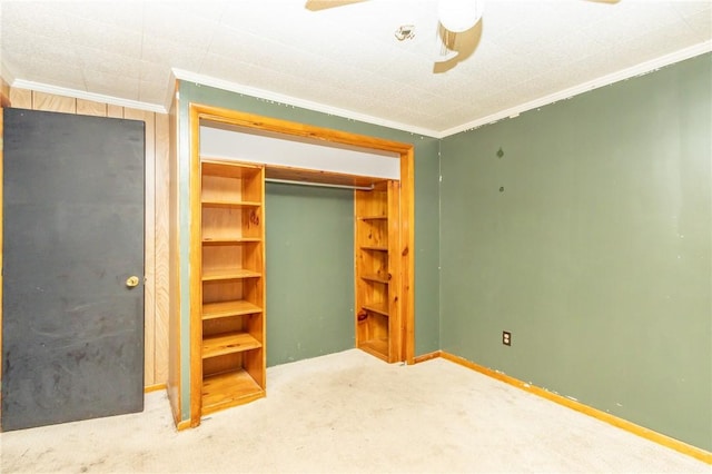 119 Deer Rd, Loyalhanna, PA 15681 - unfurnished bedroom with ornamental molding, carpet flooring, a closet, ceiling fan, and baseboards