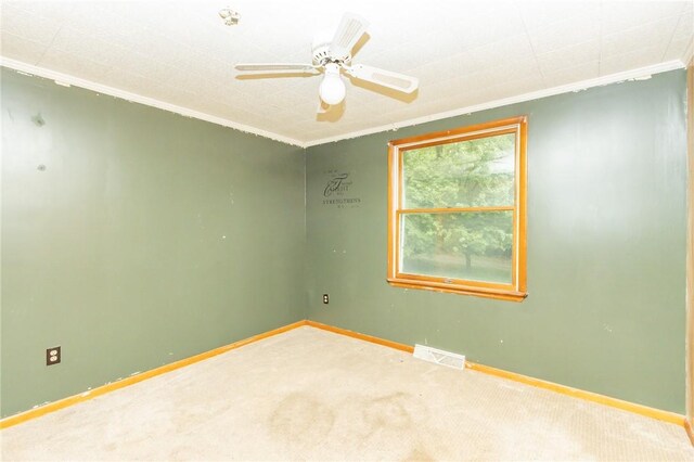119 Deer Rd, Loyalhanna, PA 15681 - carpeted empty room featuring crown molding, baseboards, and a ceiling fan