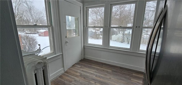 sunroom / solarium with radiator heating unit